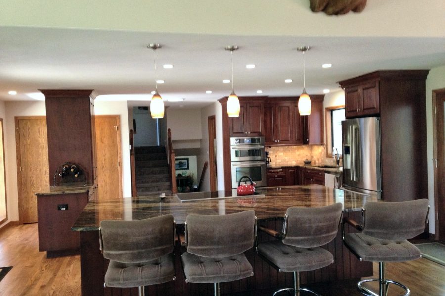Cherry kitchen with long cooktop island