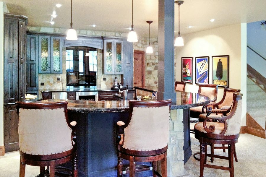 Basement bar with stacked-stone kitchenette