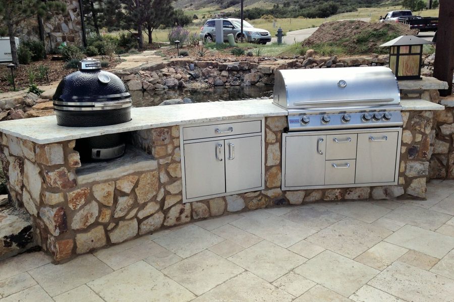Fieldstone outdoor kitchen with built-in grills